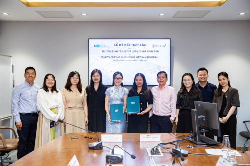 MOU signing ceremony between UEH College of Economics, Law and Government and Omega Plus Books

